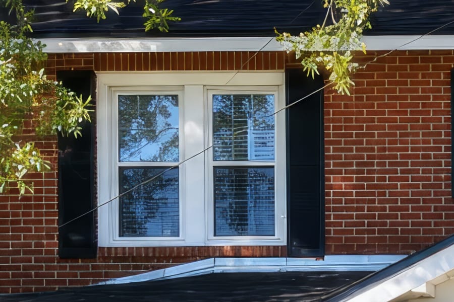 Same window crop from the 24 MP high resolution file. Shutter slats, window grilles, and mortar lines are clearly defined.
